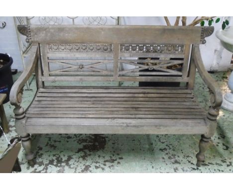 BENCH, colonial style slatted and carved teak, 132cm W. 