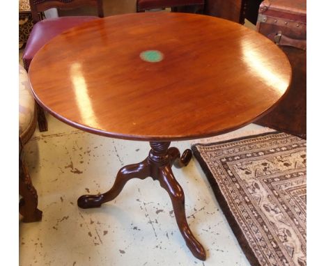 TRIPOD TABLE, George III mahogany with a circular tilt top on a turned column and triform supports, 87cm W x 74cm H. (with fa