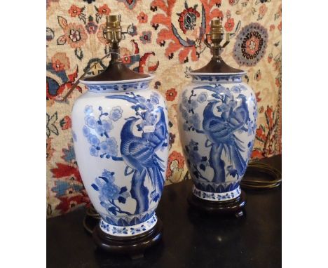 LAMP BASES, a pair, Chinoiserie blue and white vase shape on stands, 48cm H. (2)