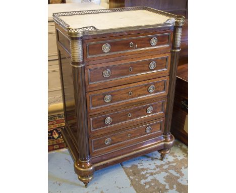 DIRECTOIRE PETITE COMMODE, 19th century French mahogany and gilt metal mounted adapted with five drawers, fluted columns, tap