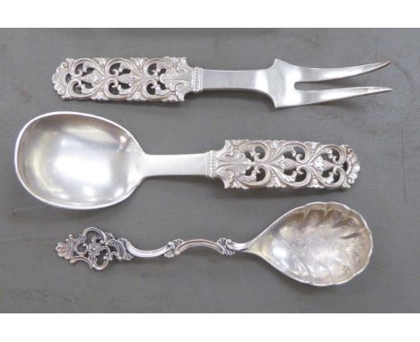 Continental silver coloured metal, viz. a two piece presentation set, a fork and spoon&nbsp; stamped 830; and an ornate spoon