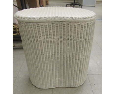 A vintage white painted kidney shaped Lloyd Loom laundry bin&nbsp; bears original label&nbsp; 21"h&nbsp; 18"w 