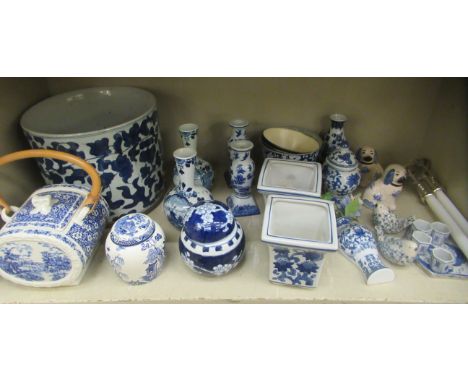 Blue and white ceramics: to include a porcelain planter&nbsp; 9"h&nbsp; 9.5"dia; and two ginger jars&nbsp; 