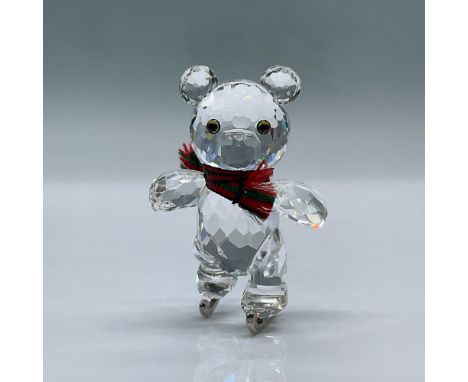 Charming little bear on ice skates wearing a scarf. This item has its original box measuring 3.25"L x 3.25"W x 3.75"H. Certif