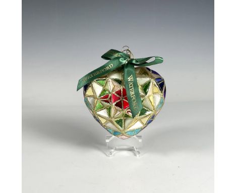 Handcrafted ornament with a stained glass design that forms a beautiful heart, featuring a geometric pattern with vibrant col