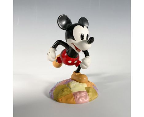 Full title: Millennium Mickey: On Top of the World, item #1206254. This special edition porcelain figurine features Mickey Mo