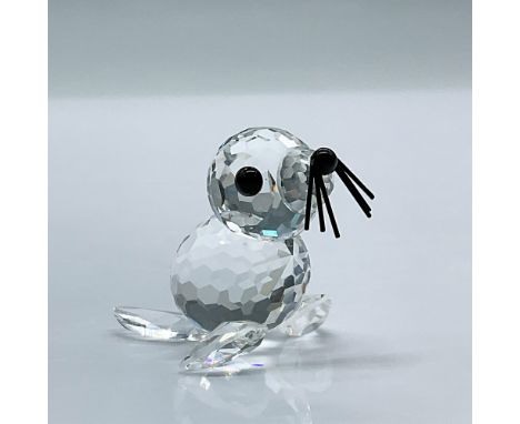 This sweet crystal seal features black eyes, nose, and whiskers. This item has its original box. 3.25"L x 3.25"W x 2.5"H. Cer