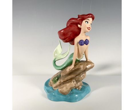 A special edition porcelain figurine of Ariel from The Little Mermaid (item #4003072), featuring the WDCC backstamp on the bo