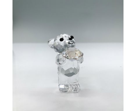 This adorable Kris Bear holds a crystal chaton engraved with SCS 2013. It features the designer initials under the left foot.