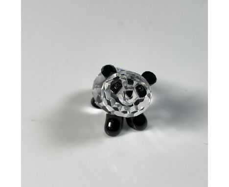 Adorable baby panda figure in a playful pose trying to stand somehow, with black accents on its ears, eyes, and legs. Swarovs
