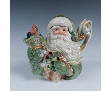 Crafted as Santa, this piece features hand-glazed green embossed leaves on his hat and coat, and Christmas stocking spout. Fi