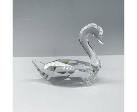 Lovely figure of a crystal swan with its head turned to the side. Swarovski backstamp. This item has its original box 5.75"L 