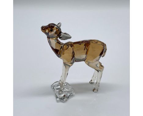 A stunning sandy-brown crystal fawn made to celebrate the 125th anniversary of Swarovski. Swarovski swan mark. This item has 