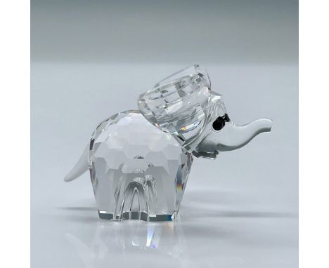 Adorable crystal elephant with a frosted tail. This item has its original box measuring 3.25"L x 3.25"W x 2.5"H. Certificate 