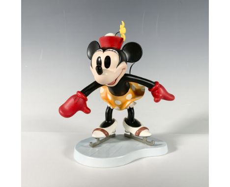 Porcelain figurine of Minnie Mouse On Ice. WDCC backstamp on the bottom. Certificate of Authenticity included. This item has 