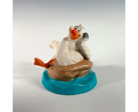 Matte finish Scuttle from The Little Mermaid. He is splayed on a rock with his head on his wing gazing upwards with a big smi