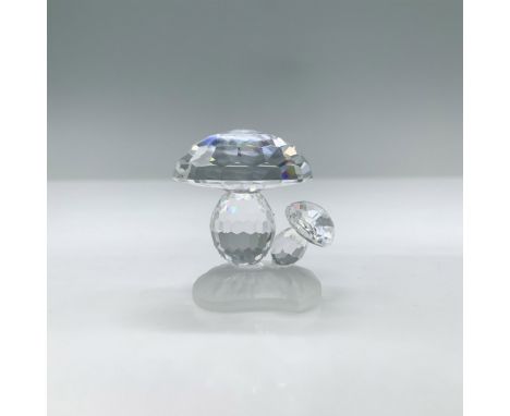 Little toadstool growing sit on a matt base. This item has its original box. Box measures: 3.25" H x 3.5" dia. Swarovski swan