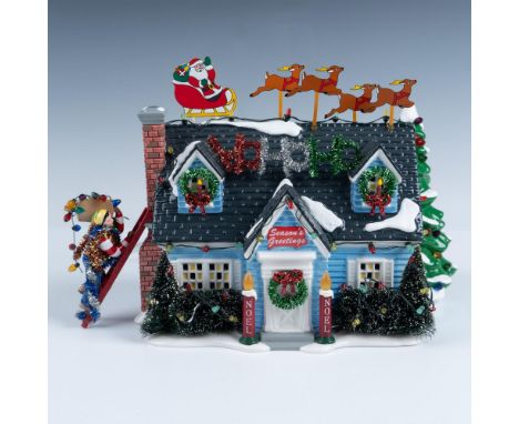 Holiday House and Christmas Trimming from The Original Snow Village Series. Blue ceramic house all decorated for Christmas. M