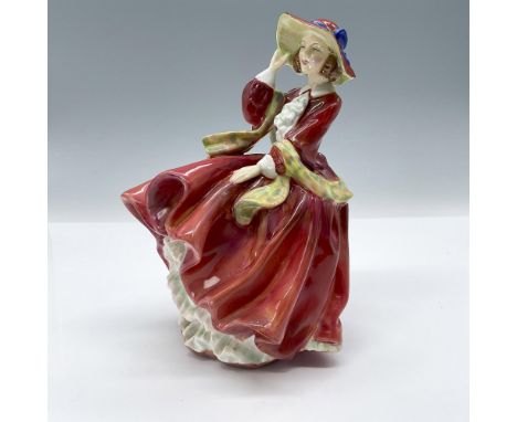 One of Leslie Harradine's most classic creations is ravishing in red from head to toe. Her colorful sash makes for a beautifu