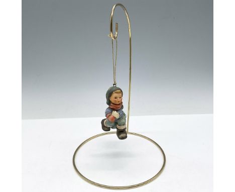 Boy carrying his tree, holding his ax. Ornament ready to hang. Issued: 20th centuryDimensions: 1.75"L x 1.5"W x 3"HManufactur