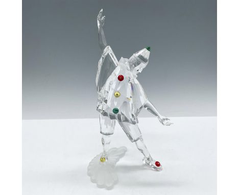 Part of the Masquerade trilogy, this first piece is clear crystal figural with satin crystal face and collar. Colored crystal