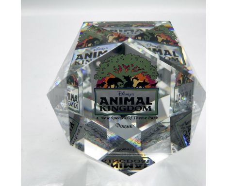 Limited edition Swarovski crystal paperweight designed with Animal Kingdom signage. Arribas Bros. and Disney marks. This item