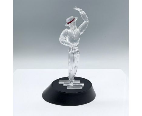 Second in the Magic of Dance trilogy. Depicts a man dancing, made from clear and red crystal. Includes a black plastic base. 