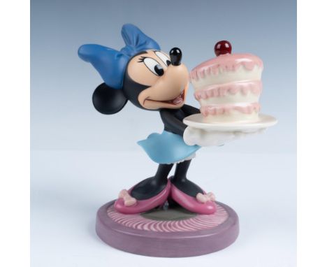 Porcelain figurine of Minnie Mouse from Walt Disney's The Little Whirlwind. WDCC backstamp on the bottom. Certificate of Auth