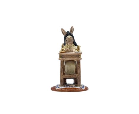 This special gold colorway edition of 100, Sister Mary Barbara Bunnykins features a glossy porcelain bunny wearing a religiou