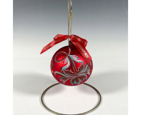 Handcrafted glass bauble adorned with hand-painted flowers in pink, blue, and yellow shades that gracefully curve around the 