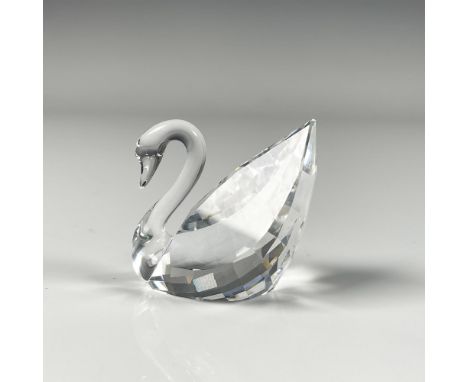 Collectible swan figure, renown for the representative Swarovski, featuring an intricate clear crystal cut design. Swarovski 