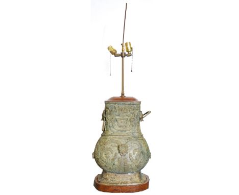 Two Chinese export bronze lamp bases, with fitments and shades