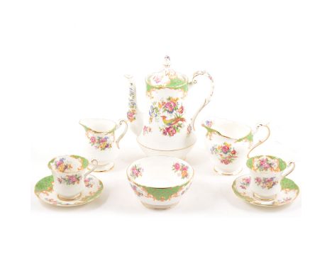 A Paragon China tea and coffee set, Rockingham pattern, comprising coffee pot (a/f), cups, saucers, cake plate etc., items of