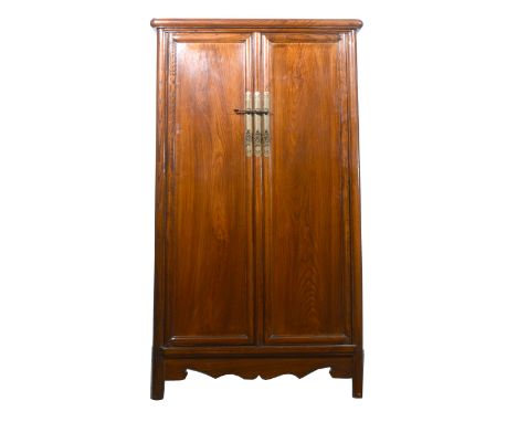 Chinese elm cupboard, rectangular top, slightly tapering sides, two panelled doors enclosing a shelf and drawers, chaped apro