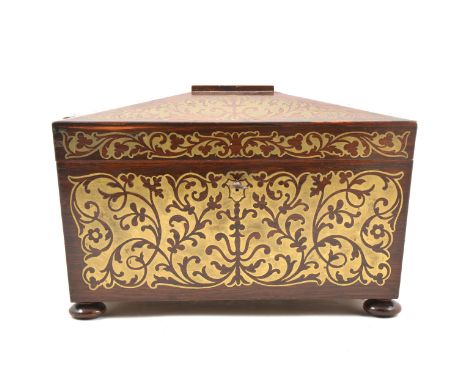 Regency rosewood and brass inlaid tea caddy, sarcophagus form, bun feet, fitted interior, 34cm.