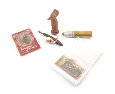 WW1 and WW2 interest; a collection of items ephemera including carved wood trench art pipe in the shape of a figure, another 