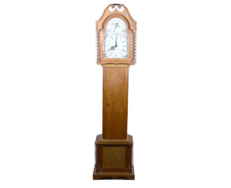 Mixed wood longcase clock, carved pediment long door, bracket feet, 12" arched painted dial, movement inaccessible, height 22