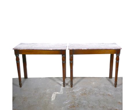 Pair of mahogany console tables, rectangular variegated marble tops, turned legs, width 103cm, depth 50cm, height 86cm. The m