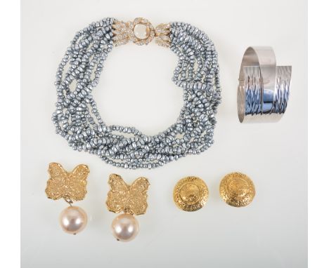 Vintage Jewellery by Ken Lane, an eight strand simulated grey freshwater pearl necklace with paste set clasp in draw string b
