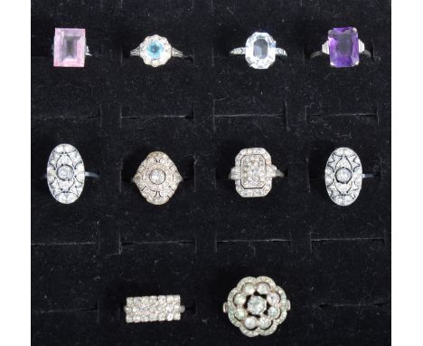 Ten Art Deco and later paste set rings, some silver set, ring sizes K-P.