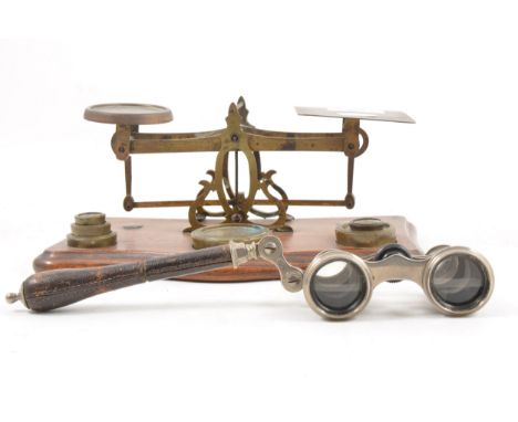 Set of postal scales, oak base, 25, with some weights and a set of opera glasses.