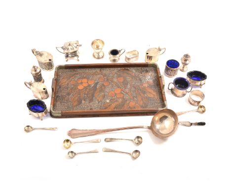 A four-piece silver condiment set by Atkin Brothers, Sheffield 1936, blue glass liners, a mustard pot and a pepperette by J B