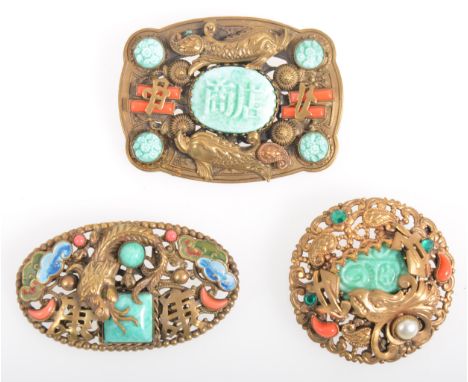 Costume jewellery influenced from The Chinese Art Exhibition of 1935-1936, probably Max Neiger, three brooches set with simul