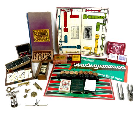 A group of vintage games and collectables, including a Victorian brass whist marker made by Perry &amp; Co, a brass wax seal 