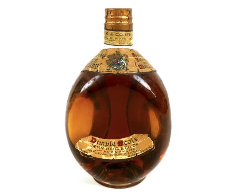 A bottle of Haig's 'Dimple' old blended Scotch whisky, circa 1940, label inscribed 'By Appointment To The Late King George V'