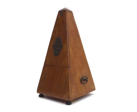 A 19th century French 'Metronome de Maezle', with walnut case, raised upon bun feet.