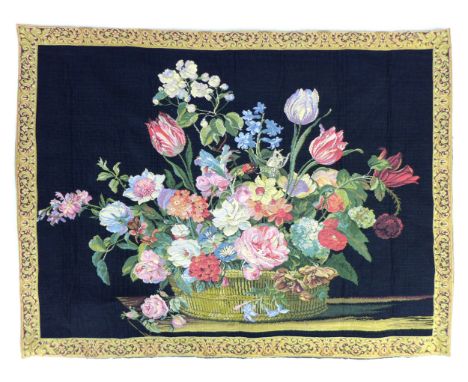 A Belgian Metrax tapestry, circa 1980, depicting a basket of flowers, against a black ground, 100 by 132cm.