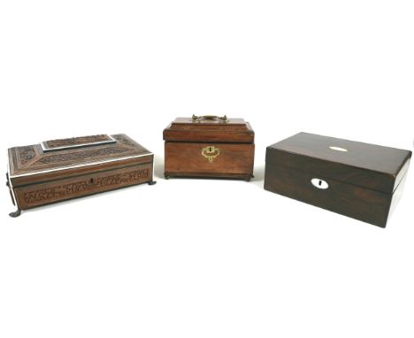 A group of three wooden boxes, comprising a George III caddy top tea caddy with brass handle to its lid, raised upon bracket 