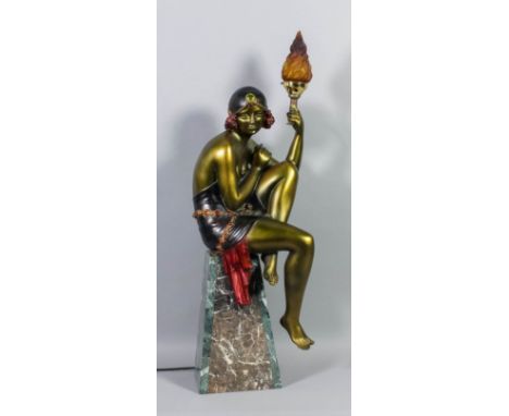 A 1930s French painted and gilt composition electric table lamp in the form of a seated dancer in the Art Deco manner, on fig