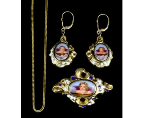 A late 19th Century Continental gold coloured metal mounted enamel and porcelain set brooch, the centre with an oval porcelai
